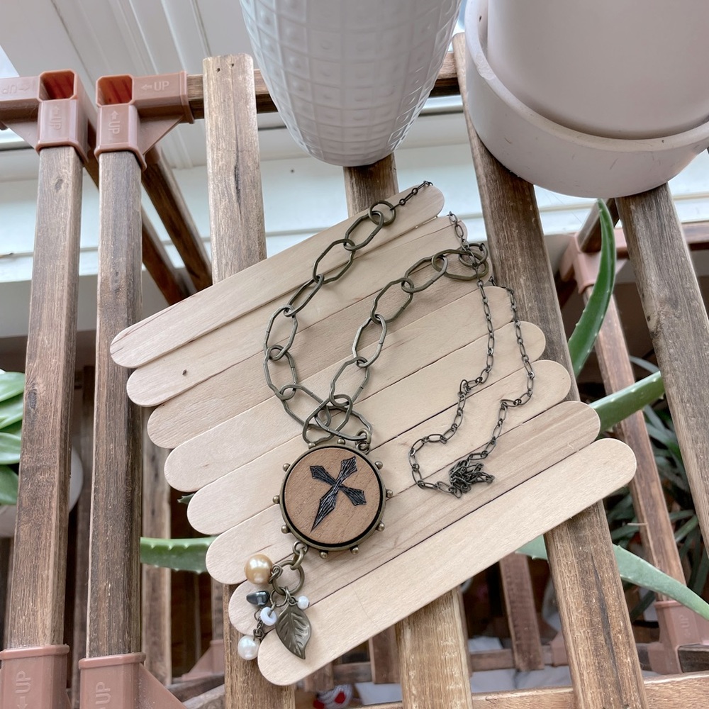 Handmade bronze and wood woodburned cross necklace